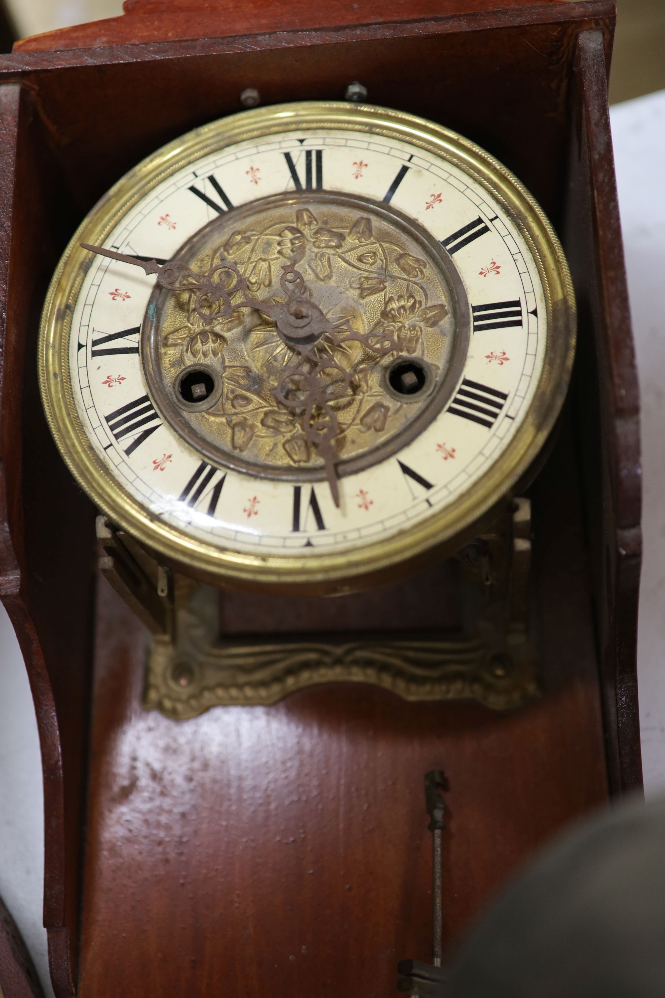 A wall clock and a thirty hour clock movement